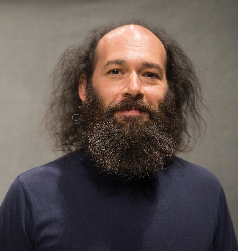 David Siegel, Ph.D in dark blue sweater