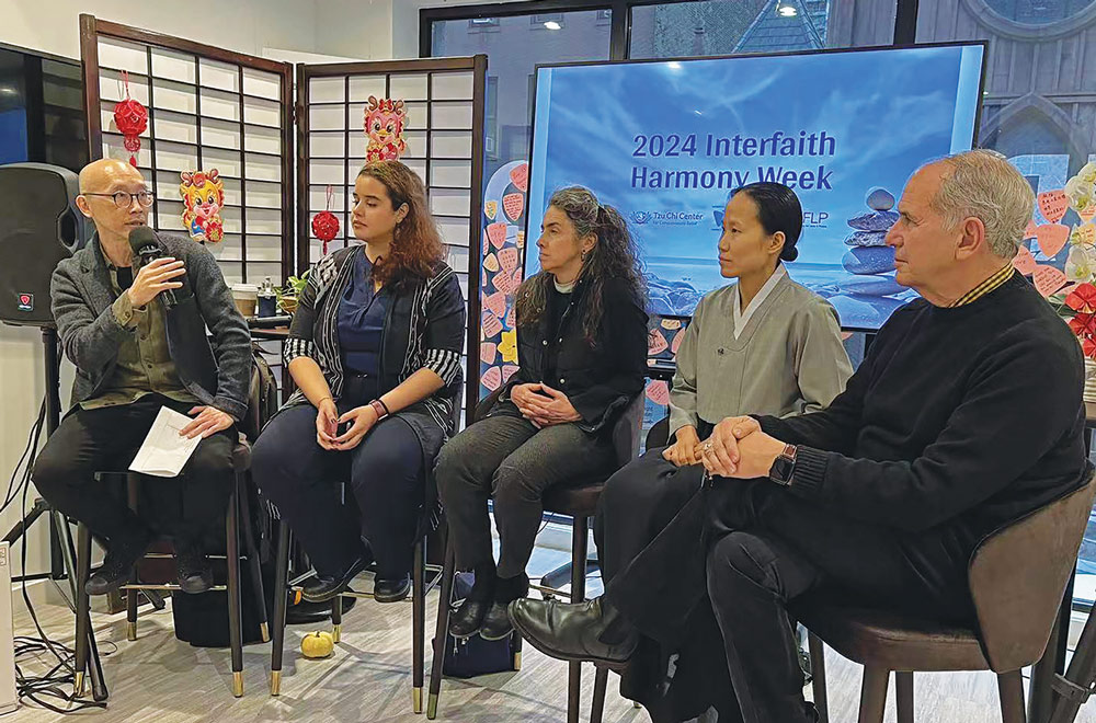 diverse group of individuals seated on chairs, attentively facing a large screen in a collaborative setting