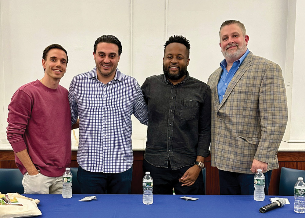alumni panelists posing together