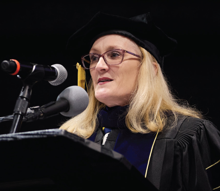 female professor at podium