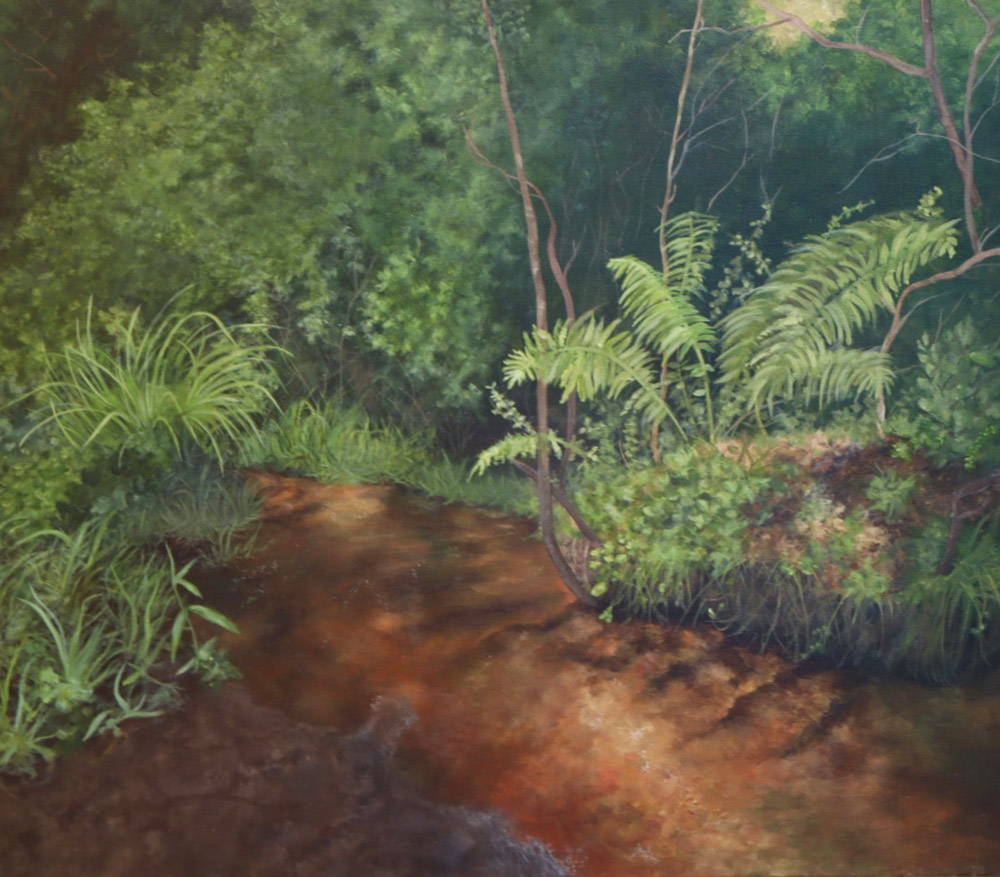 Oil painting of a lush, sun-dappled forest floor. A narrow, reddish-brown stream flows past vibrant green ferns and thick undergrowth, with soft light filtering through the dense canopy.