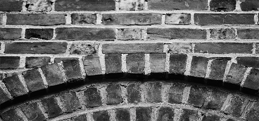black and white photo of bricks